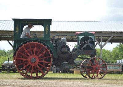 A man handling farming/agriculture equipment